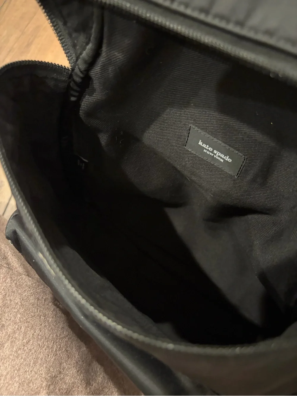 kate spade black nylon mini backpack with front zip pocket